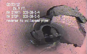 Total pipe collapse: Same pipe as previous image, as viewed from the opposite side of the collapse.